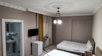 حجز غرفة بيج بوس واحدة بها سريرين مفردين