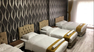 حجز فندق بيج بوس غرفة واحدة 4 أسرة