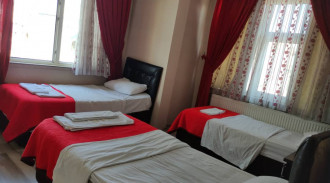 حجز فندق كينت ثلاث نجوم غرفة فردية ذات ثلاث أسرة (2)