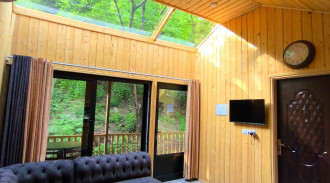 كوخ غابة ذو سقف زجاجي تاسيان