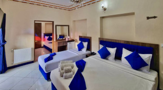 حجز فندق تقليدي بخمسة ابواب (خمسة اسرة)