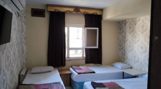 رزرو مهمانپذیر خانواده اتاق سه تخته 302