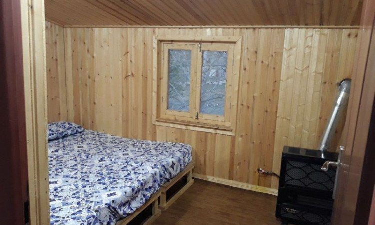 اجاره ویلا4 خوابه چوبی جنگلی طاسکوه