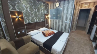 حجز فندق أربع نجوم بستان - سرير فندقي واحد