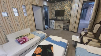 حجز فندق 4 نجوم بستان - 5 اسرة وغرفة نوم واحدة