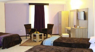 فندق سينجو سويت 4 أسرة عادية