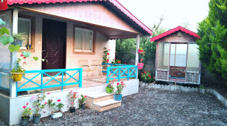 اجاره ویلای زنبق با آلاچیق و دسترسی به امکانات شهری