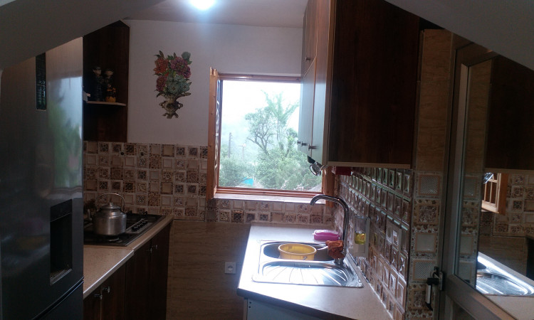 اجاره ویلای جنگلی در دامنه کوه وسط باغ چای