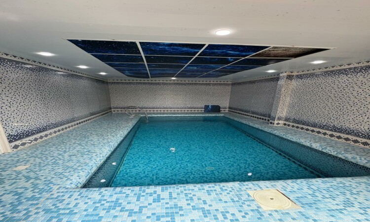 حمام سباحة Nyakan Spa كوخ خشبي مزدوج من الحجر
