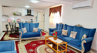 ویلا دو خواب نوساز با حیاط پر از گل