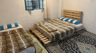 رزرو بوم گردی قلعه افرینش اتاق سبز