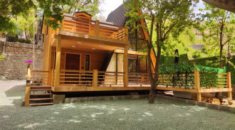 اجاره کلبه سوئیسی جکوزی دار لب رودخانه